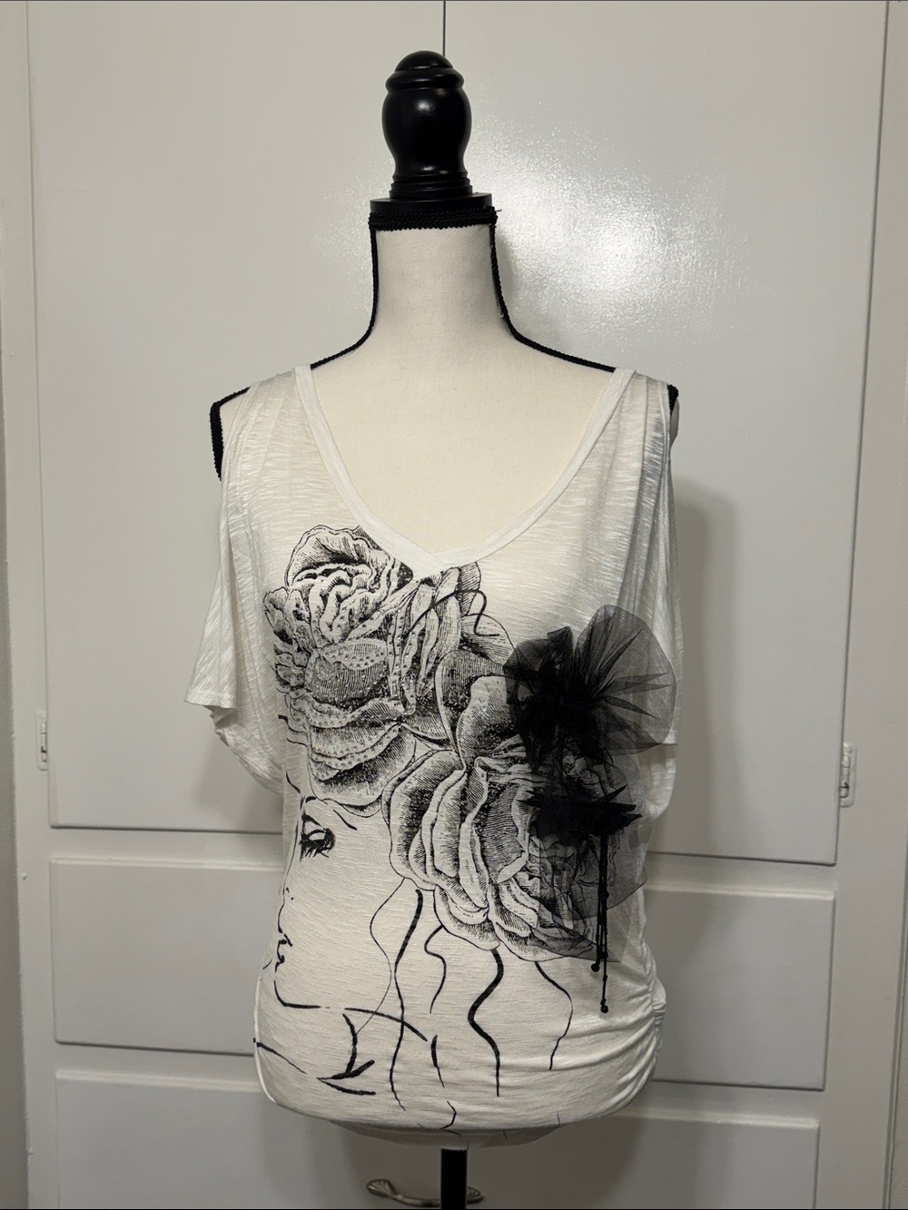 White Floral Graphic V-Neck Women’s Top with Black Applique